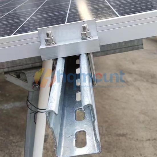 Solar mounting clamp installed on square tube ground mount structure