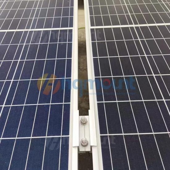 Solar mounting clamp installed on square tube ground mount structure