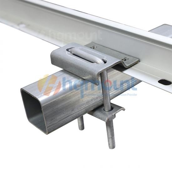Solar mounting clamp installed on square tube ground mount structure